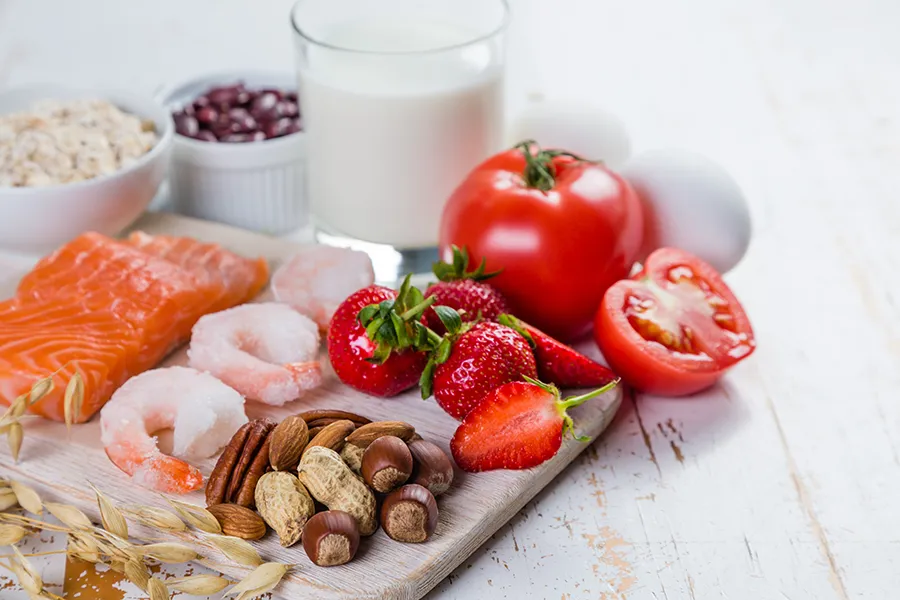 A board of foods like nuts, shellfish, and dairy, that are commonly associated with allergies. Get treatment for food allergies from Frank Lanzisera, D.C. in Tampa Bay Metro.